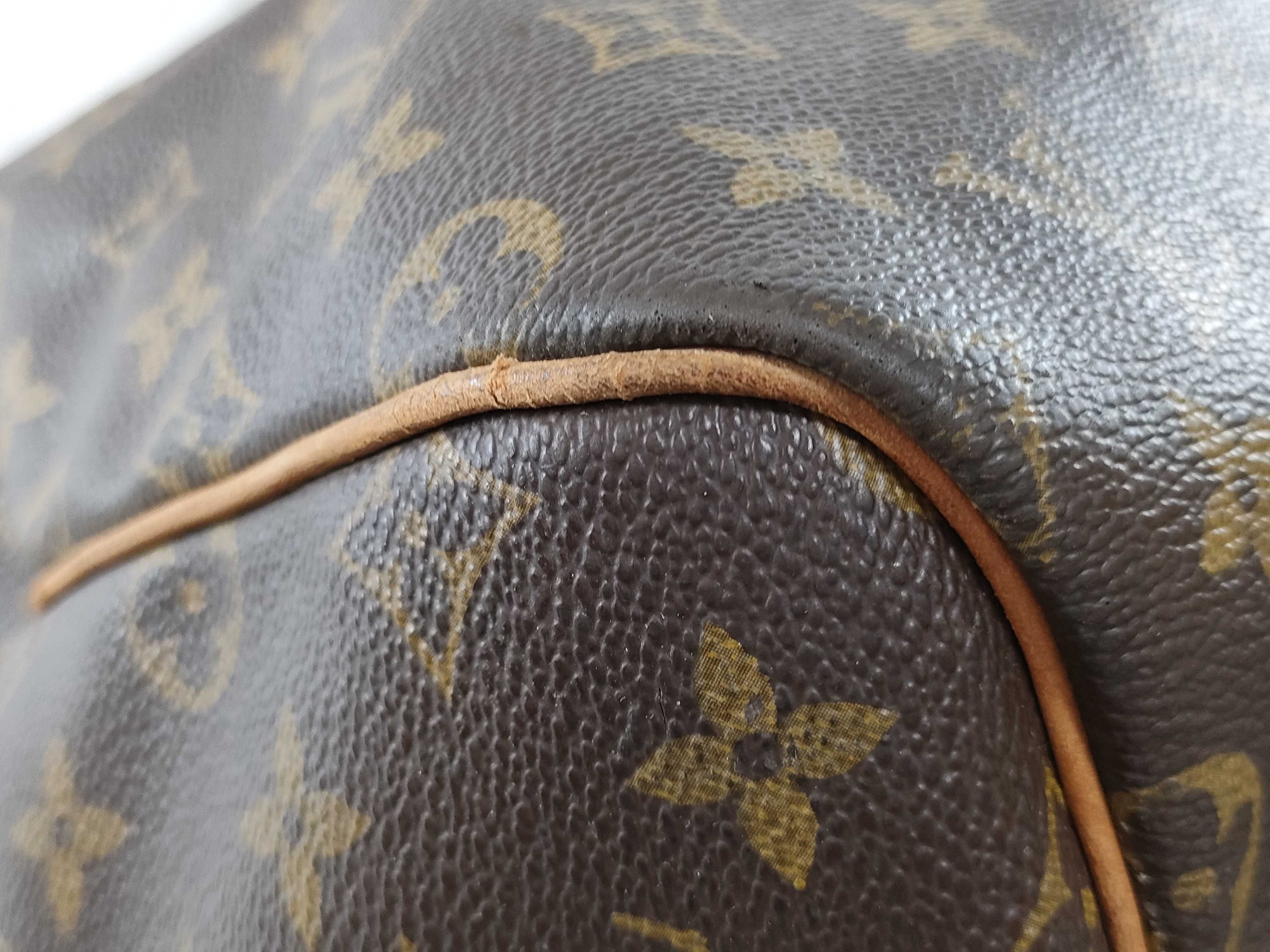 Louis Vuitton Keepall 55 Monogram Duffel Bag (M41424)