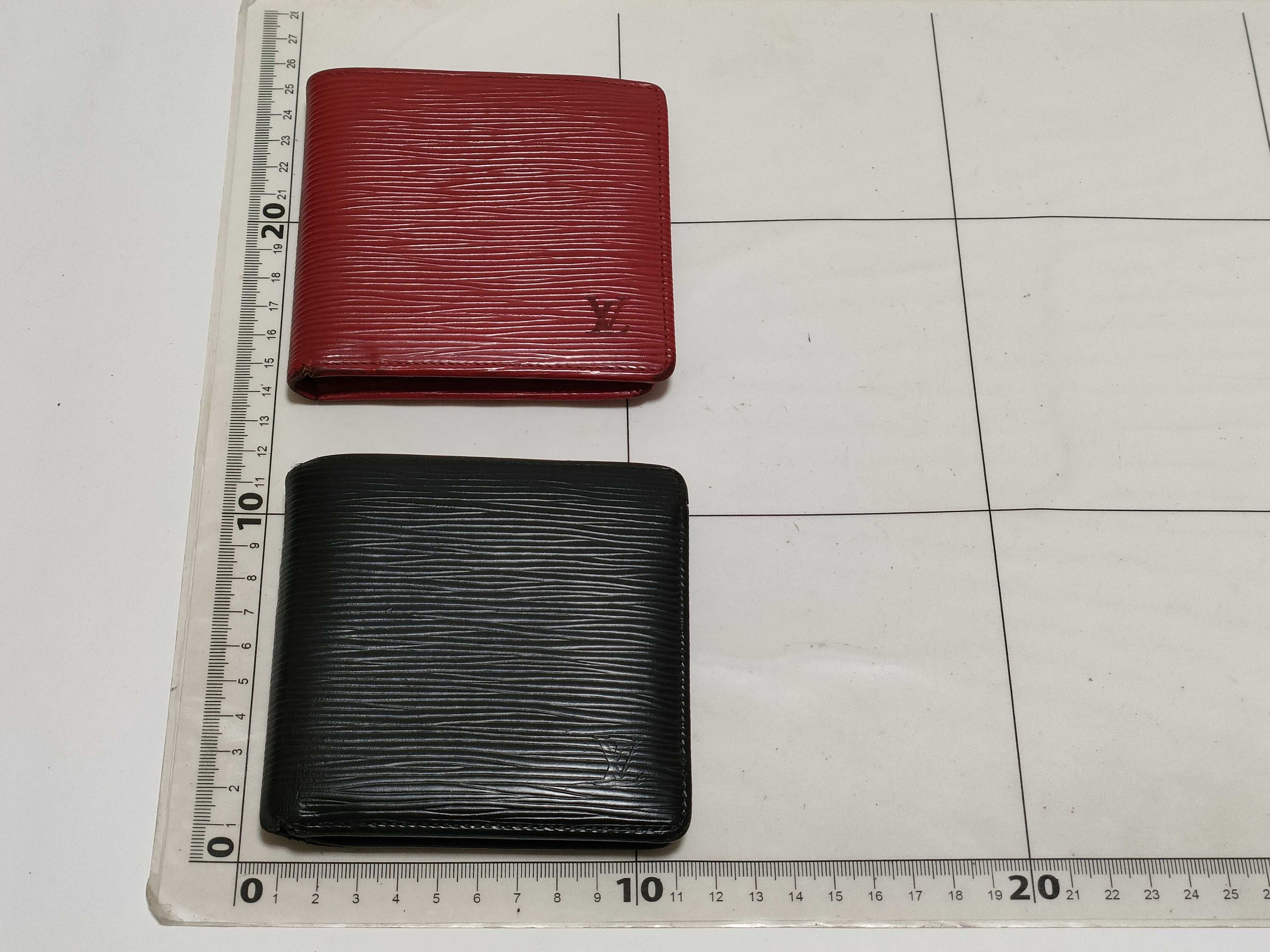 Two Louis Vuitton Epi Wallets