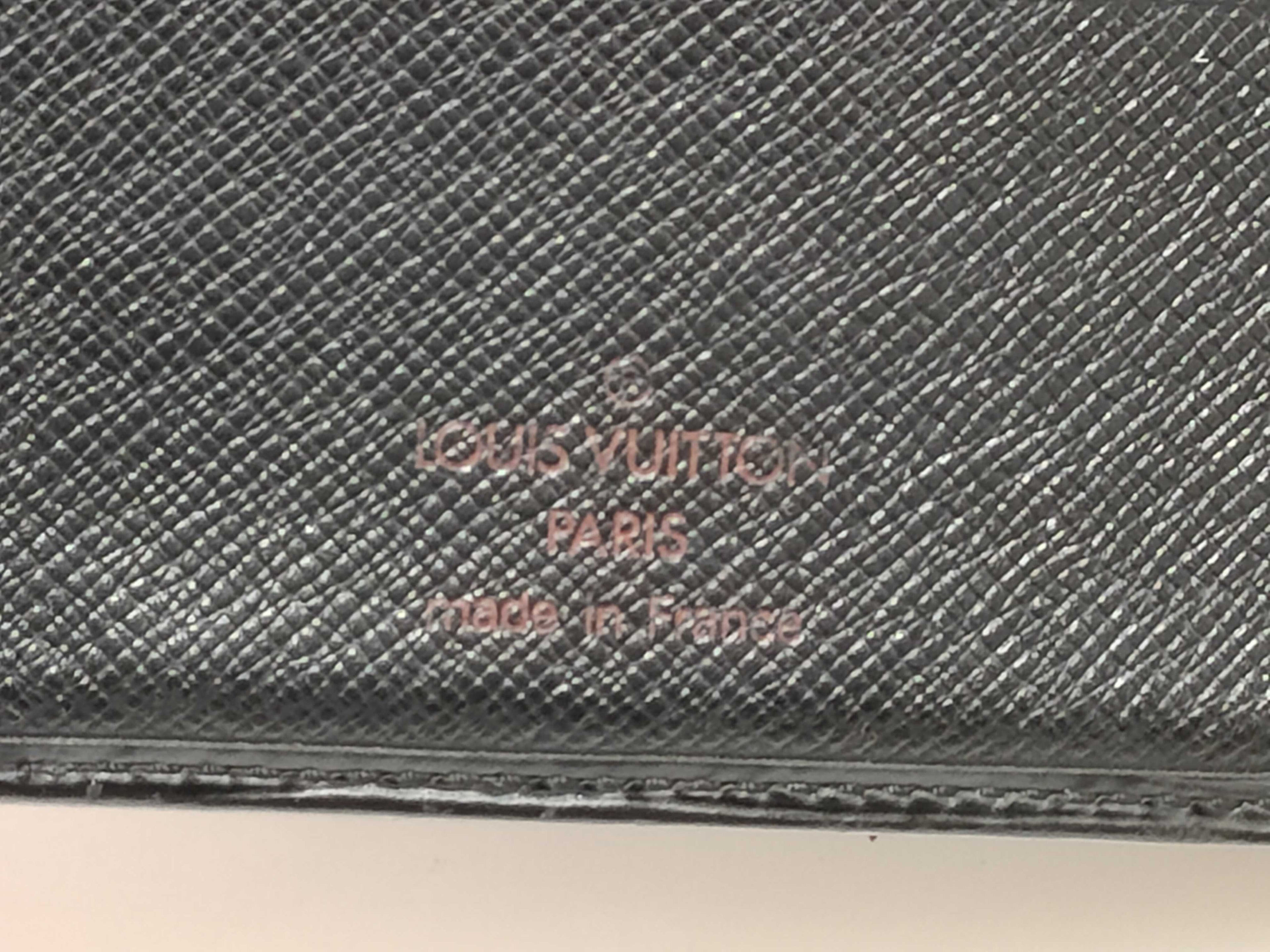 Two Louis Vuitton Epi Wallets