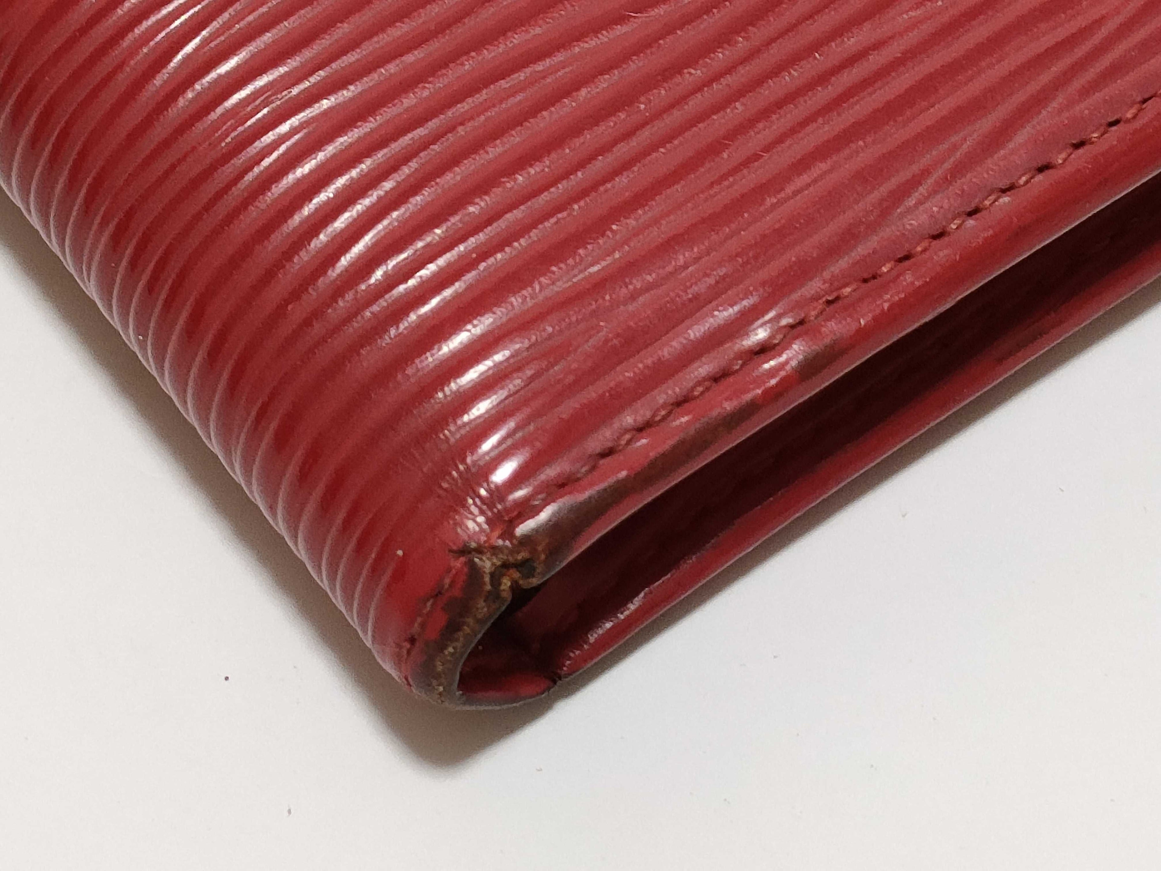 Two Louis Vuitton Epi Wallets