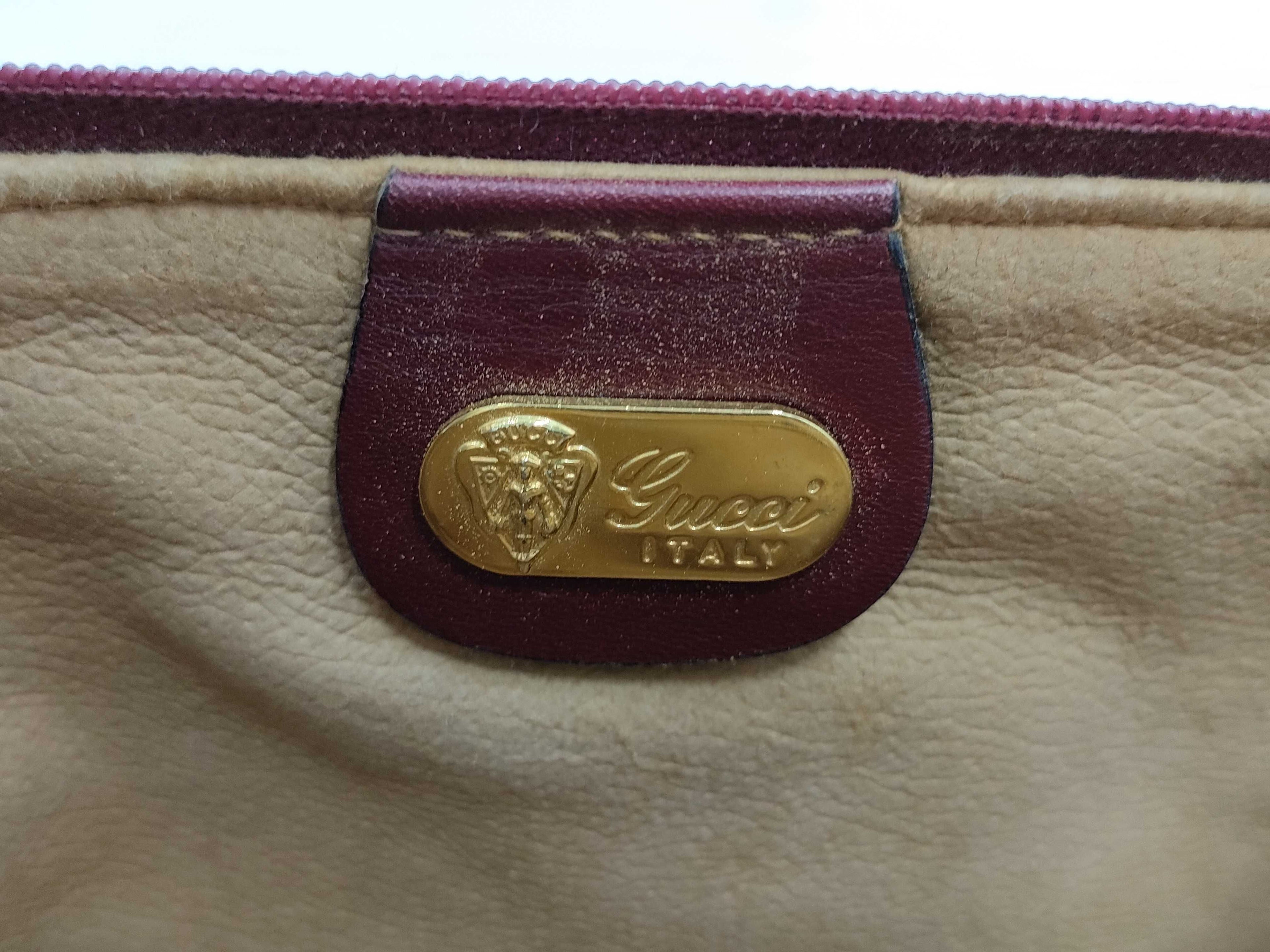 Gucci GG Supreme Monogram Clutch