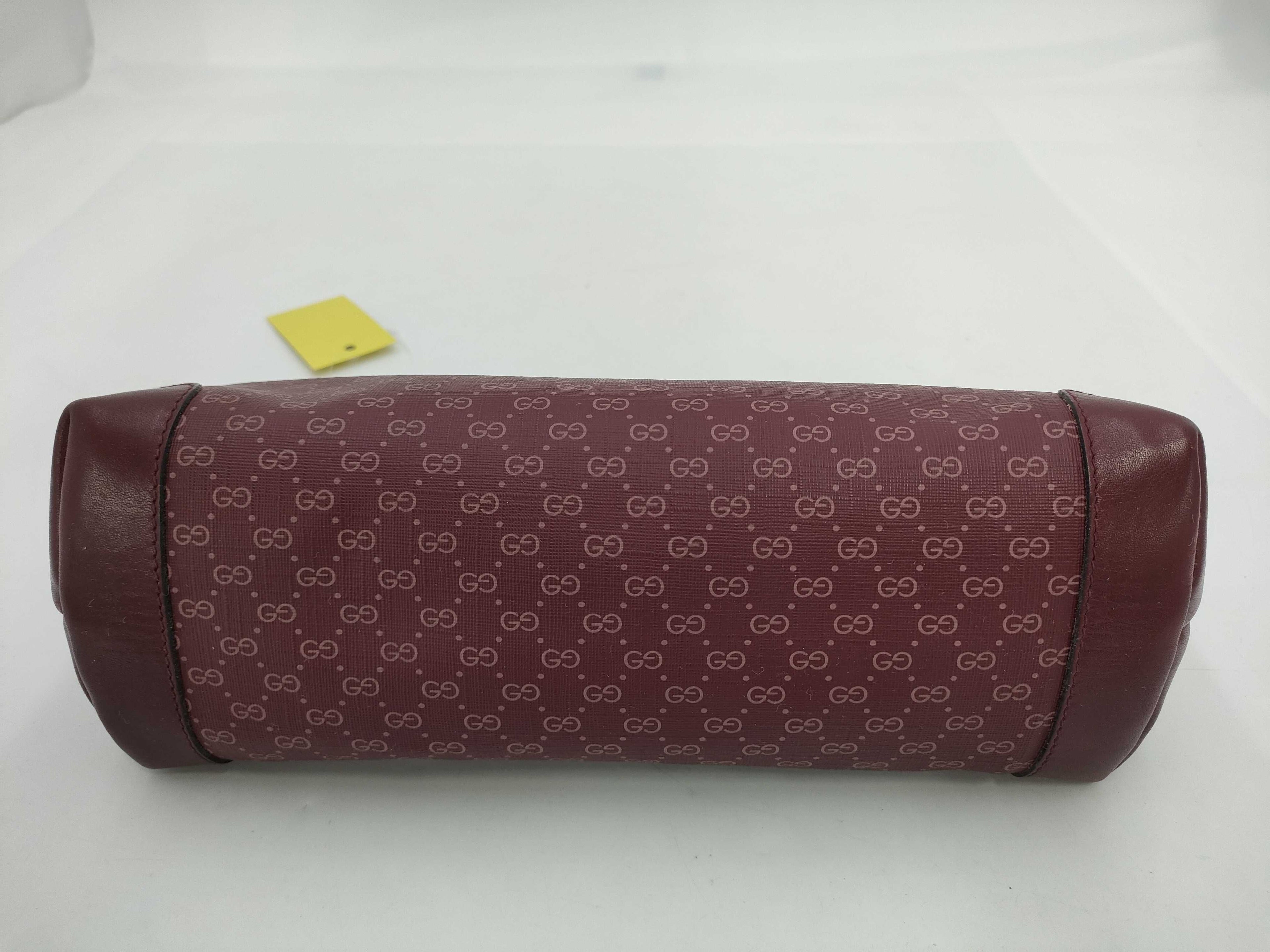 Gucci GG Supreme Monogram Clutch