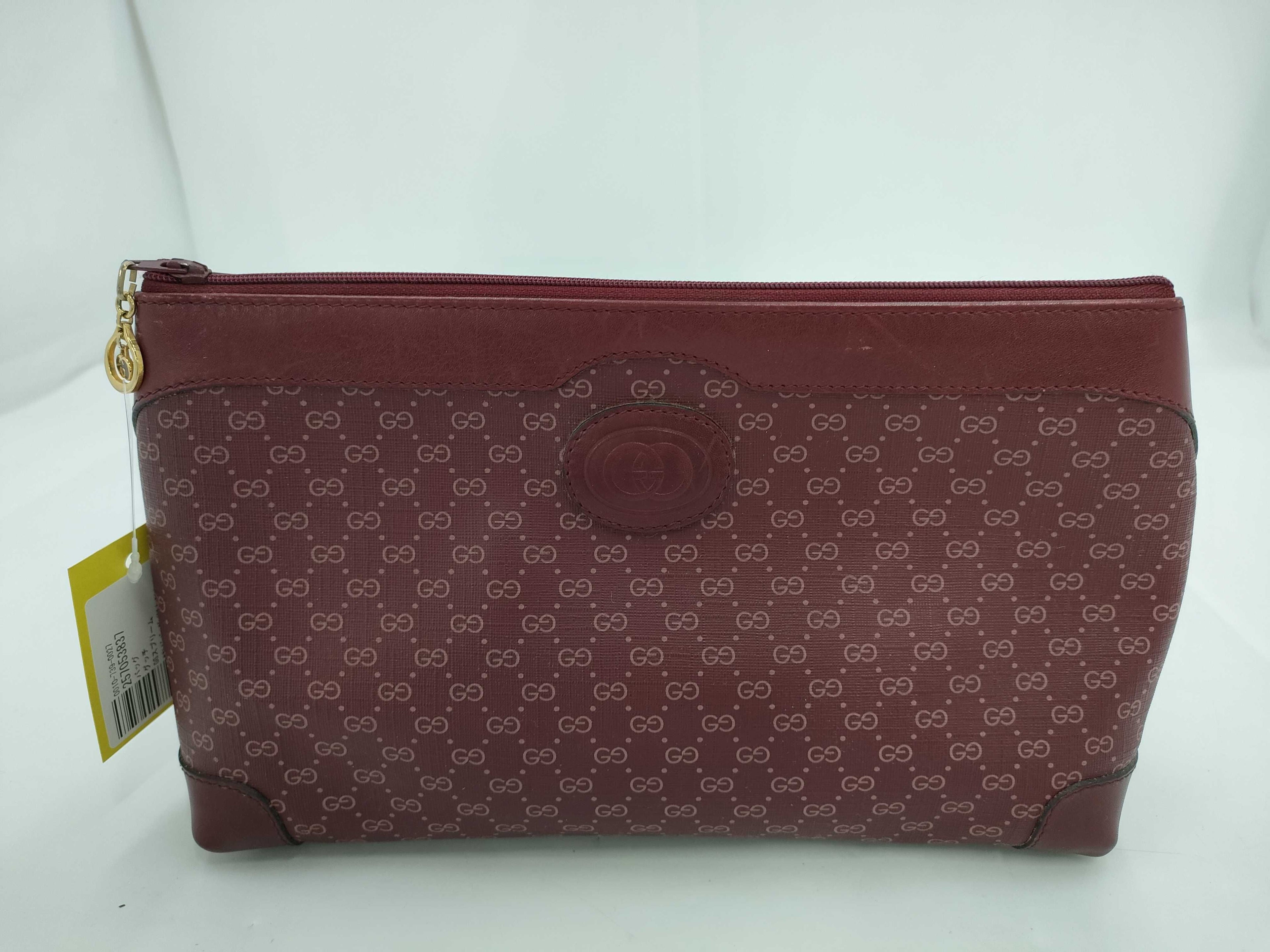 Gucci GG Supreme Monogram Clutch